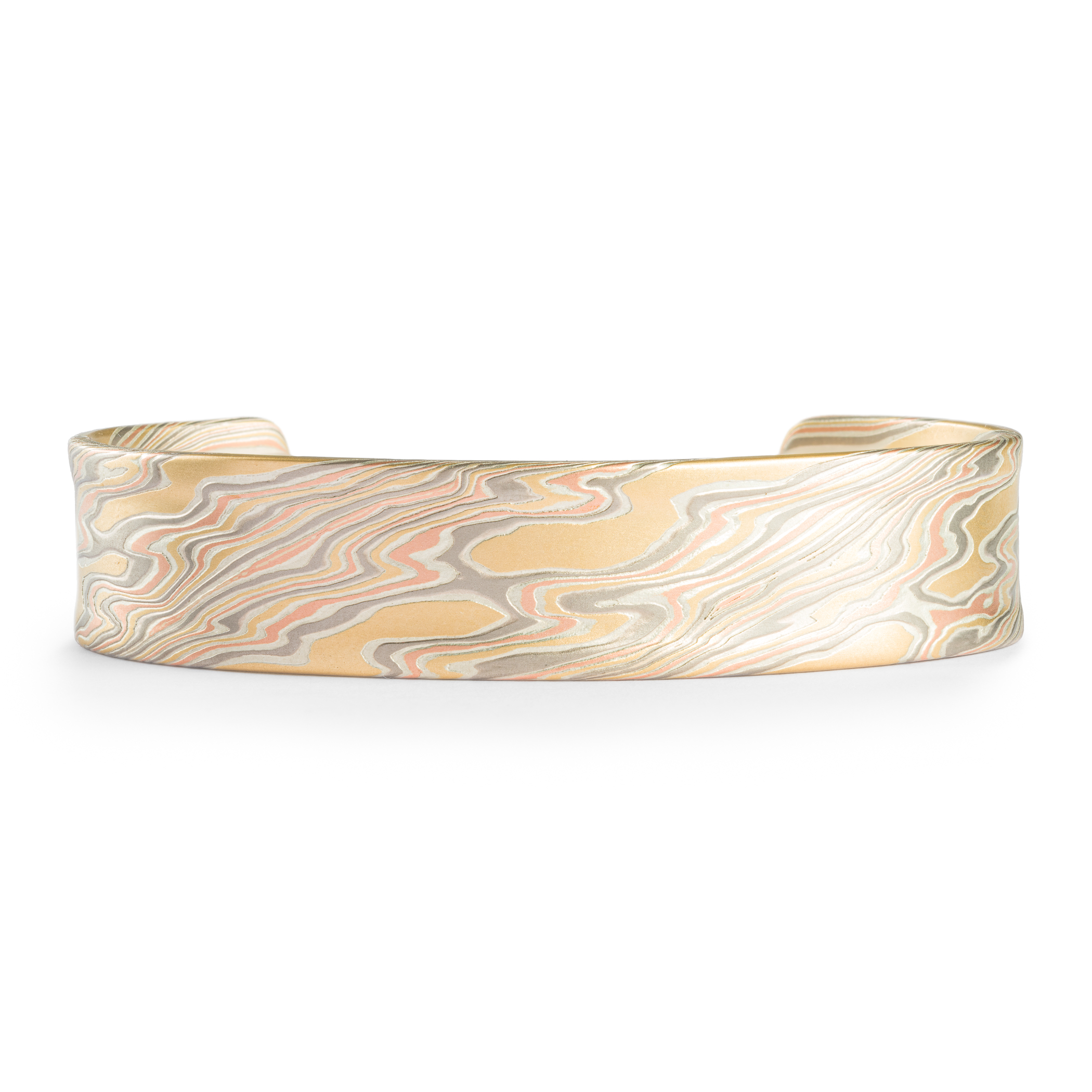Mokume gane patterned mens bangle, wide, slightly textured, made with yellow gold, red gold, palladium and silver.
