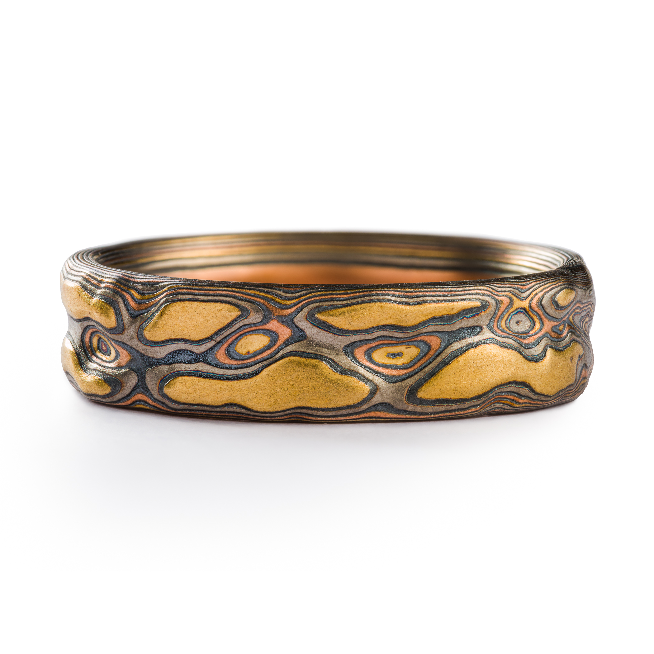 This 6mm Mokume Gane ring in Guri Bori style has a unique tactile beauty with swirling patterns in the Firestorm metal combination.
